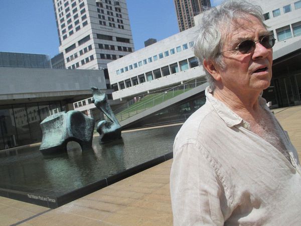 Hampton Fancher at the reflecting pool with Henry Moore's Reclining Figure (Lincoln Center) 1963–5